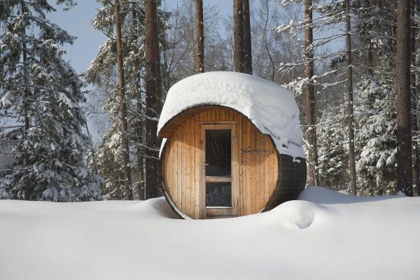 Round Barrel Sauna in the Snow